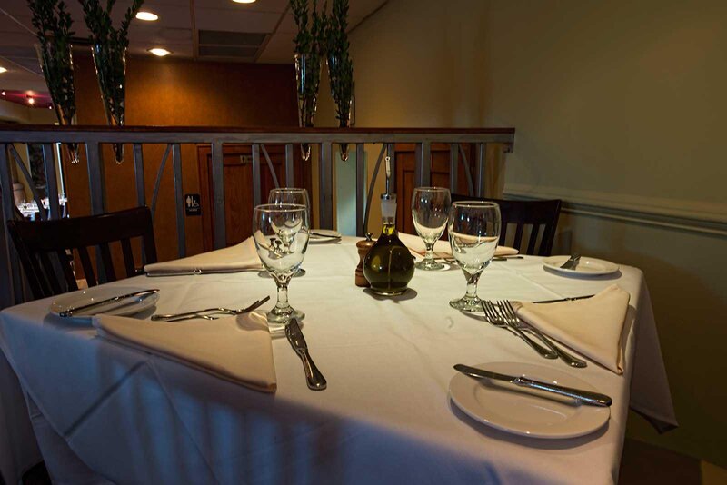 Dining room table set for group of four