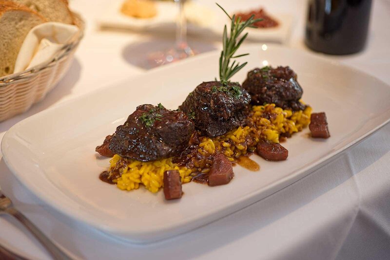 Beef steak entree on a bed of rice