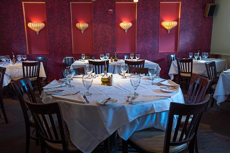 Dining room photo with focus on table set for six