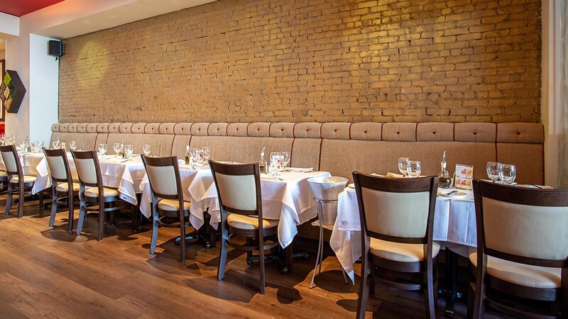 Booth and chair seating in dining room